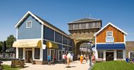 Outlets en de binnenstad: de vrienden van morgen?