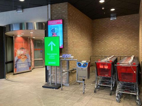 Delhaize gaat winkelkarretjes automatisch ontsmetten