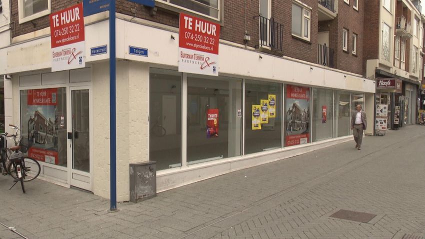 Minder woningen en horeca in lege winkelpanden