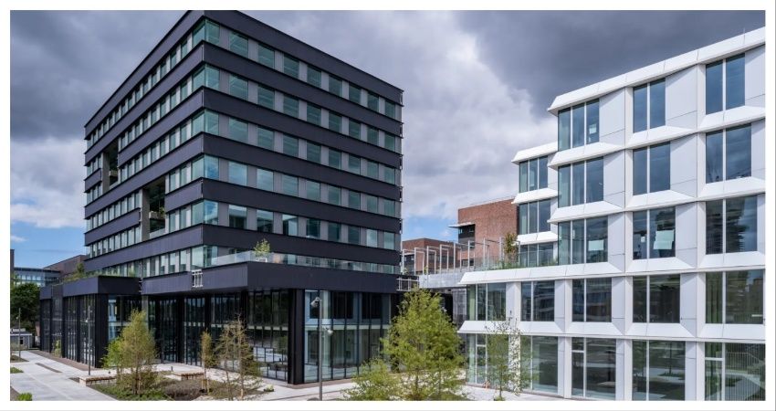 Amstam en Group Aaron kopen kantoorgebouw Max & Moore in Amsterdam-Noord